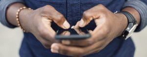 image of person on phone making phone call