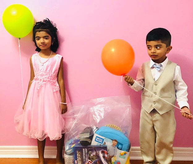 Boy and girl receiving gifts